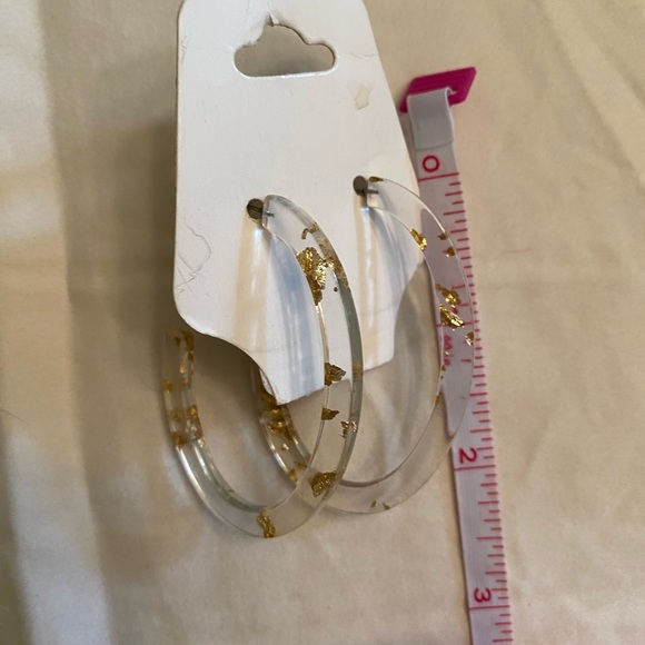 Clear earrings with gold specs - Picture 2 of 2